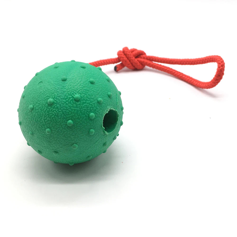 Pelota de goma indestructible con cuerda.